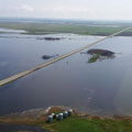 Rising liquid associated with the Quill Lakes threatening Highways 6 and 16.